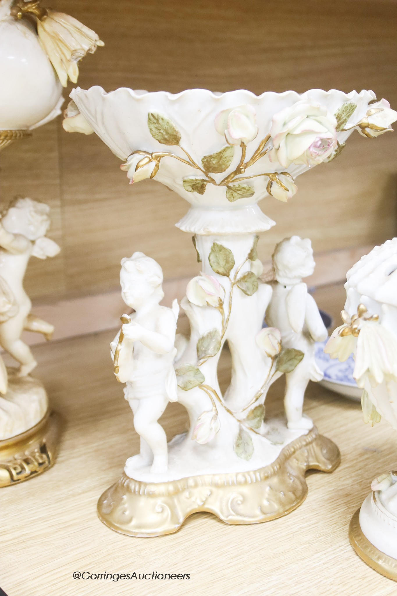 A group of Moore Bros porcelain including a lamp, centrepiece etc